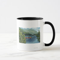 Couple Canoeing on a Lake