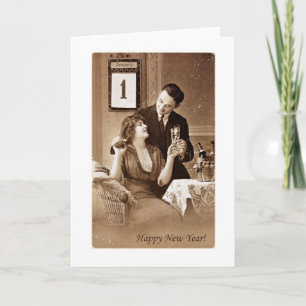 couple celebrating new year with champagne,vintage holiday card