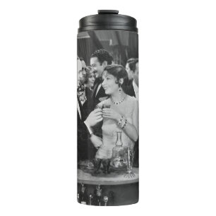Couple having drink at crowded bar thermal tumbler