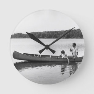 Couple in a Canoe Round Clock