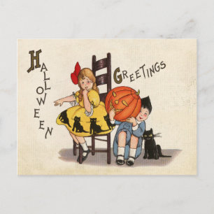 Couple of kids with carved pumpkin, Halloween Postcard