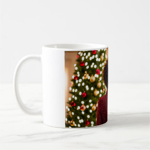 Couple of women in front of a Christmas tree Coffee Mug