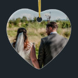 Couple Photo Quote Who You Have Beside You Heart Ceramic Ornament<br><div class="desc">A heart shape ornament with romance in mind for any time of the year! Easily swap in your favourite picture of the two of you on the front and on the back lovely words It doesn’t matter where you go It’s who you have Beside You. You can personalise the words...</div>