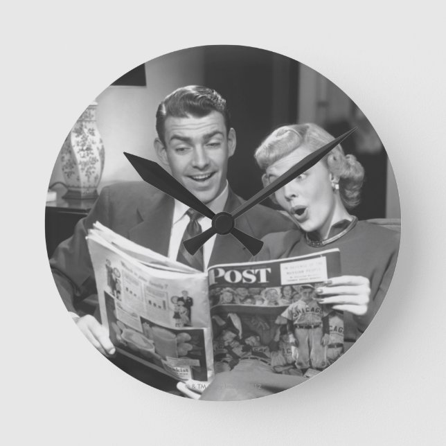 Couple Reading Magazine Round Clock (Front)