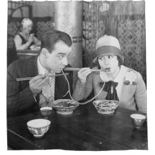 Couple sharing a noodle in a restaurantvintage, fo