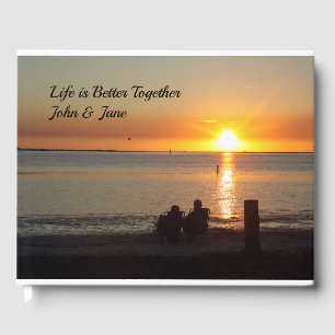 Couple Sit On Beach At Sunset Guest Book