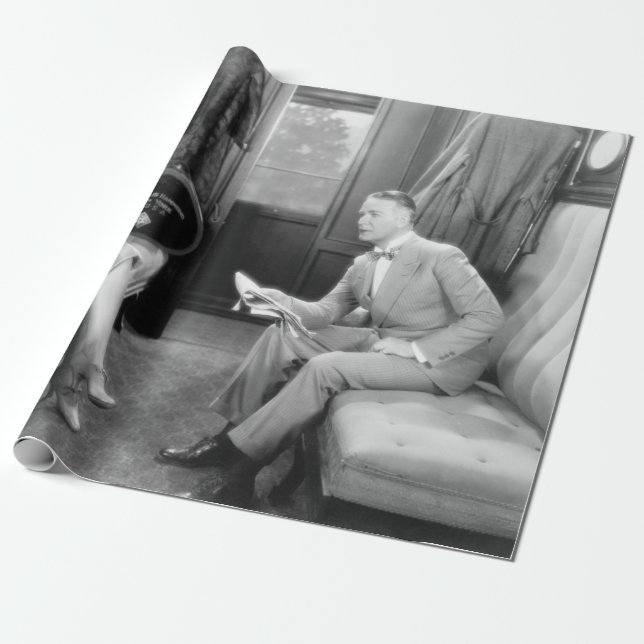 Couple sitting together in a compartment of a trai wrapping paper (Unrolled)