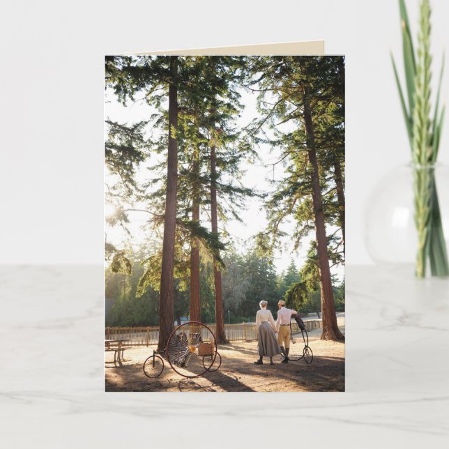 Couple walking in sunshine with Victorian cycles Card (Front)