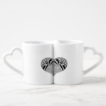 Couples nesting coffee mugs with heart design