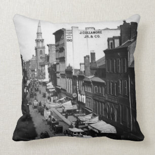 Coussin 1859 : Le trafic et magasins sur la rue de