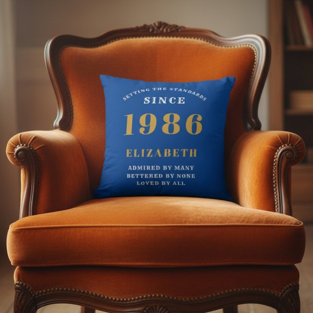 Coussin 40th Birthday 1986 Add Name Blue Gold Personalized (1986 blue throw pillow on an orange chair)