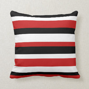 Coussin à rayures rouge, noir et blanc