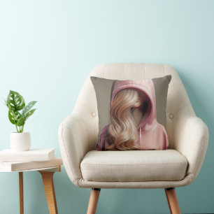 Coussin Adolescente blonde en sweat-shirt rose