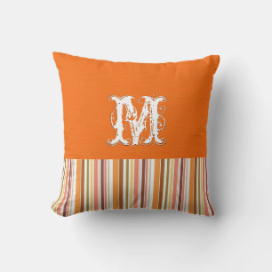Coussin Arrière - plan orange clair. Bandes rétro Monogram