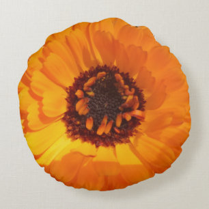 Coussin arrondi à fleurs orange