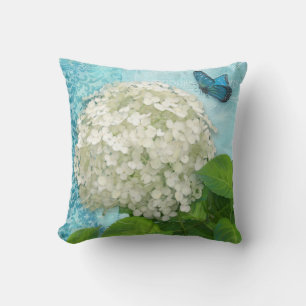 Coussin Art bleu de papillon d'hortensia blanc de Snowball