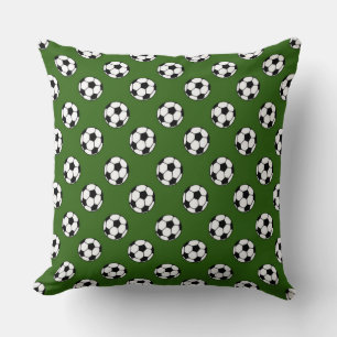 Coussin Ballons de soccer noir et blanc sur vert