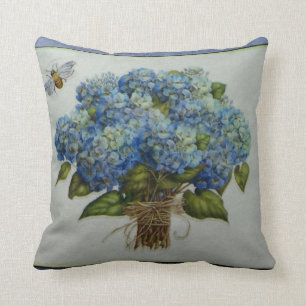 Coussin beaux hortensias bleus avec une abeille