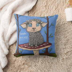 Coussin Bébé mouton sur tabouret