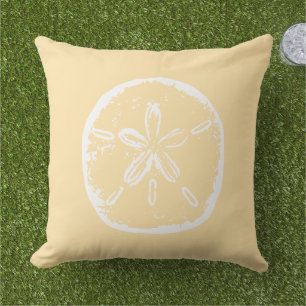 Coussin Beige de plage et coquille de dollar de sable blan