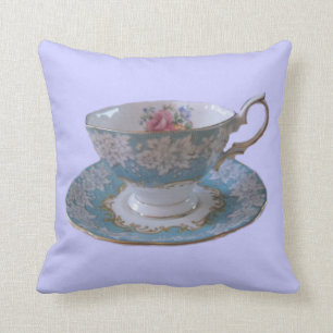 Coussin bleu et blanc de tasse et soucoupe de thé