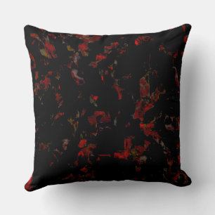 Coussin Boutons rouges forts sur base rocheuse gris foncé,
