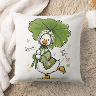 Coussin Canard mignon avec parapluie en feuille et bonnet