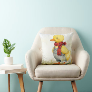 Coussin Caneton à l'aquarelle portant une salopette en jea