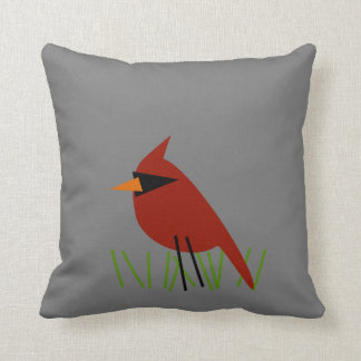 Coussin Cardinal sur l'herbe avec le gris