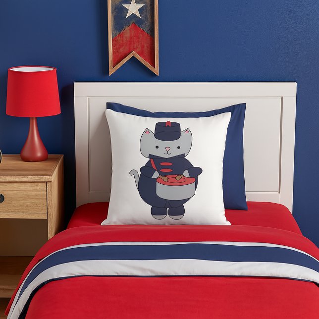 Coussin Cat Marching Band Drummer Navy Blue Red (A throw pillow featuring a gray cat playing the drums in a navy blue & red marching band uniform.)