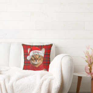 Coussin Chat de Noël Abyssin sur un plaid rouge de vacance