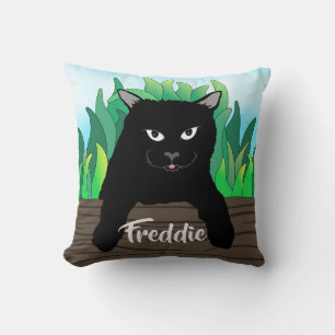 Coussin Chat noir à la clôture avec herbe verte, dos solid