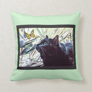 Coussin Chat noir et papillon (sur l'arrière - plan en bon
