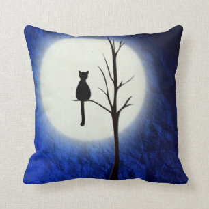 Coussin chat noir sur le carreau de l'arbre 2