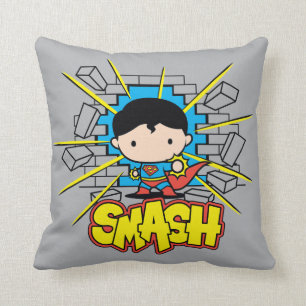 Coussin Chibi Superman Frappant À Travers Un Mur De Brique