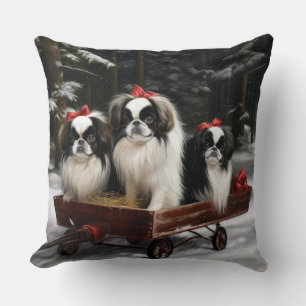 Coussin Chien Japonais sur un traîneau enneigé décoration 