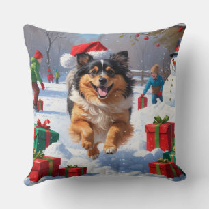 Coussin Chien Keeshond courant dans la neige avec un chape