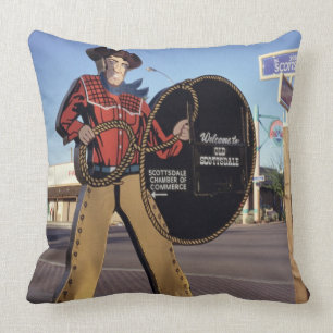 Coussin Chiffre signe de cowboy accueillant des touristes