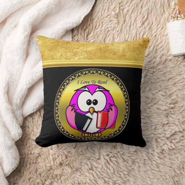Coussin Chouette rose et blanche tenant des livres scolair (Couverture)