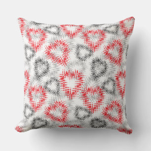 Coussin Coeurs brisés en rouge et gris sur blanc