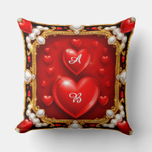 Coussin Cœurs rouges ornés d'or et de perles