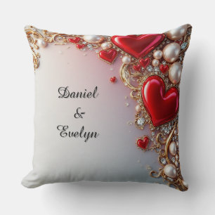 Coussin Cœurs rouges ornés d'or et de perles