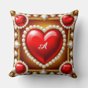 Coussin Cœurs rouges ornés d'or et de perles