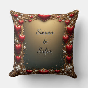 Coussin Cœurs rouges ornés d'or et de perles