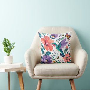 Coussin Colibri dans un jardin fleuri en fleurs