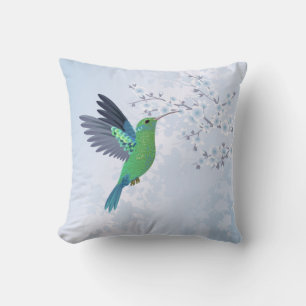 Coussin Colibri vert avec fleur de cerisier bleue