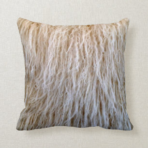 Coussin Conception de la fourrure en peau de mouton blanch