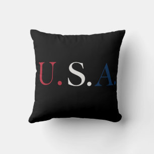 Coussin Conception de lettrage rouge, blanc et bleu des Ét