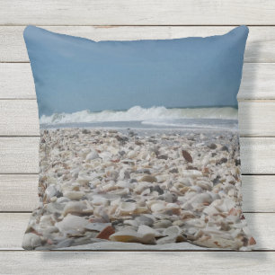 Coussin Coquillages mignons sur la copie de photo de plage
