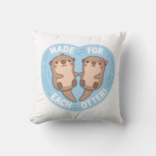 Coussin Couple de loutres mignonnes, fait l'une pour l'aut